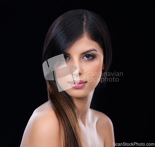 Image of Beauty, hair care and portrait of woman with makeup in studio for health, wellness and salon treatment. Confident, cosmetic and female person with facial and hairstyle routine by black background.