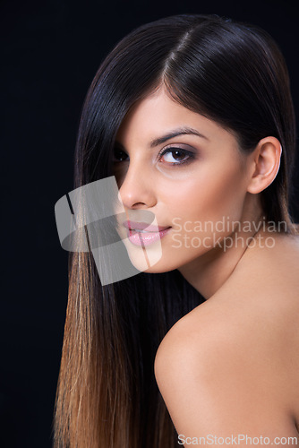 Image of Hair care, health and portrait of woman in studio with salon, beauty or conditioner treatment. Wellness, confident and female person with long, shiny and cosmetic hairstyle by dark black background.