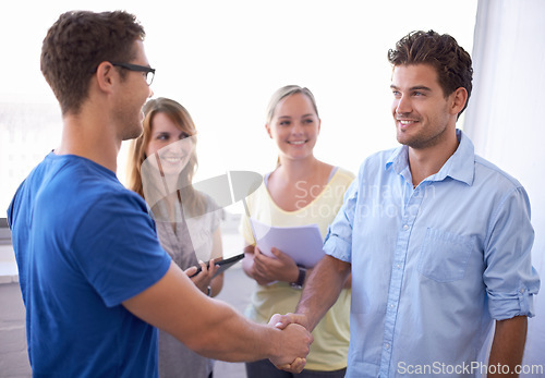 Image of Team, handshake and welcome employee for startup, career and happy for acceptance at job. Internship, meeting and partnership for work, business and onboard workforce for collaboration in workplace