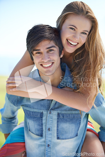 Image of Couple, portrait and piggyback for fun in nature, love and care in relationship on outdoor date. Happy people, embrace and carrying on holiday or vacation, bonding and laughing on adventure at park