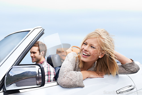 Image of Happy, travel and couple in car for transportation on adventure, holiday or vacation with suitcases. Smile, love and young man and woman driving in vehicle for weekend road trip journey together.