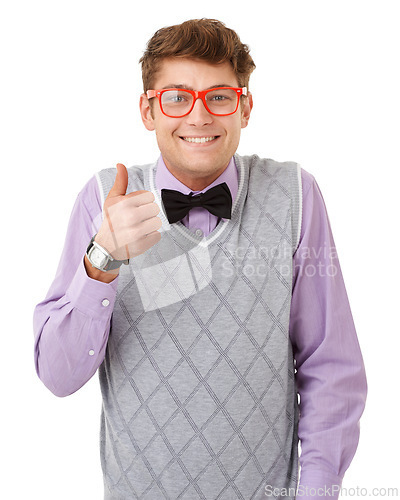 Image of Portrait, thumbs up and glasses with nerd man in studio isolated on white background for agreement. Smile, yes or like with happy and confident young geek in eyewear for success, support or thank you