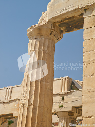 Image of Greek history, ancient pillar or city with keystone arch, architectural detail for tourist attraction site. Traditional, outdoor or crumbling stone of temple building for culture in Acropolis Greece