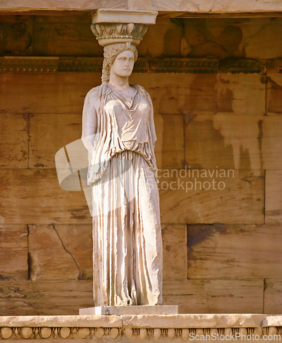 Image of Greek history, ancient pillar or statue with keystone arch, architectural detail or tourist attraction site. Background, outdoor or stone sculpture of temple building for culture in Acropolis, Greece