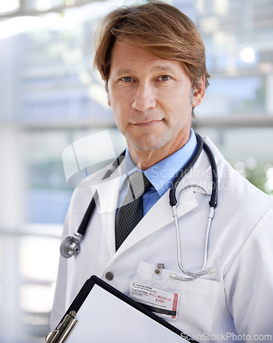 Image of Portrait, doctor and clipboard in hospital for healthcare, documents or patient records. Face, medical professional and paper for information, checklist or treatment plans for cardiology at clinic