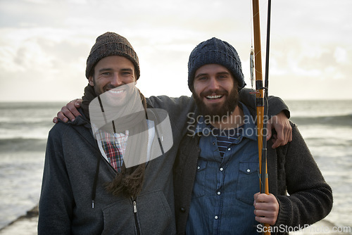 Image of Fisherman, friends and hug with portrait for fishing in the morning by sea with happiness, bonding and sky. Friendship, men and face with smile, embrace or rod by water for hobby, holiday or activity