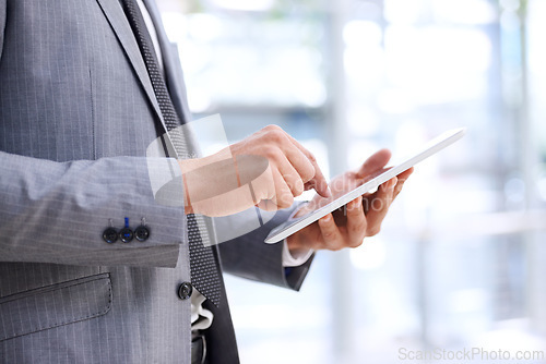 Image of Businessman, hands and tablet in office for schedule, investment planning or online risk assessment. Professional man, corporate and technology for web, search and digital portfolio management