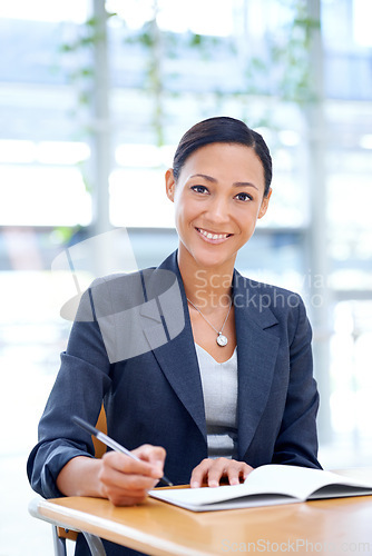 Image of Portrait, smile and woman with a notebook, writing and planning with a PR consultant or confidence. Face, person and employee with idea, schedule or calendar for startup or decision with productivity