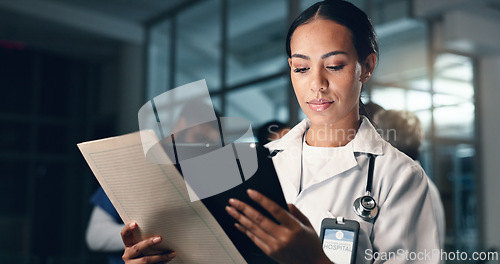 Image of Doctor, woman and tablet with document, night and analysis for results, decision and info in hospital. Medic, digital touchscreen and paperwork for health, history and planning for thinking in clinic