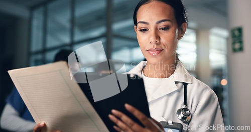 Image of Doctor, woman and tablet with document, night and analysis for results, decision and info in hospital. Medic, digital touchscreen and paperwork for health, history and planning for thinking in clinic