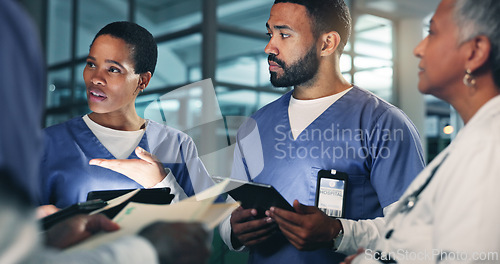 Image of Doctor, team and tablet at night with planning medical, healthcare and clinic surgery. Hospital team, employee conversation and planning with research and results information for collaboration