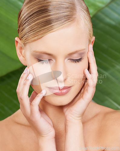 Image of Beauty, skincare and touching face with leaf background for wellness, natural and plant for smooth feel. Woman, cosmetic and dermatology for facial, routine and self care for healthy aesthetic skin