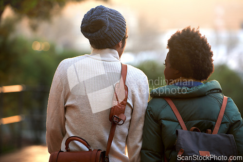 Image of Back view, university student and friends in outdoor on campus, contemplate and relax with backpack in cold weather. College, interracial and classmate for chill, think and plan for assignment.