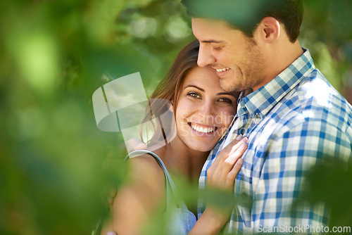 Image of Portrait view, of a happy young couple hug, nature out in the park and bonding outdoors. Love, relationship and travel with romantic partners, getaway date for holiday summer and laughing in Rome