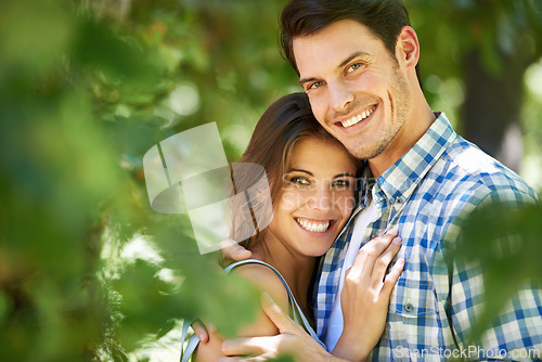 Image of Portrait, happy young couple and hug in nature in the park and bonding outdoors in Italy. Love, relationship and travel with romantic partners, getaway date for holiday summer laughing with affection