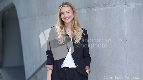 Image of Confident Businesswoman Smiling in Smart Casual Attire