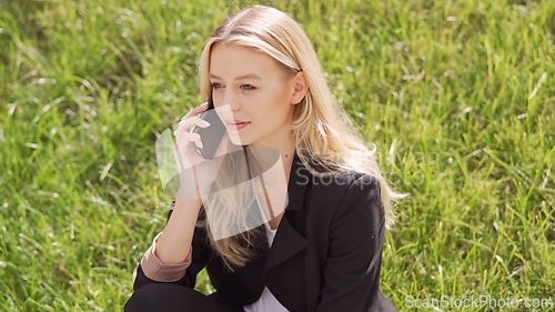 Image of Professional Woman Taking a Break in Nature