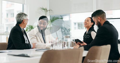 Image of Tablet, meeting and collaboration with a business team in the boardroom for presentation, planning or strategy. Teamwork, technology and corporate people in an office together for a training workshop