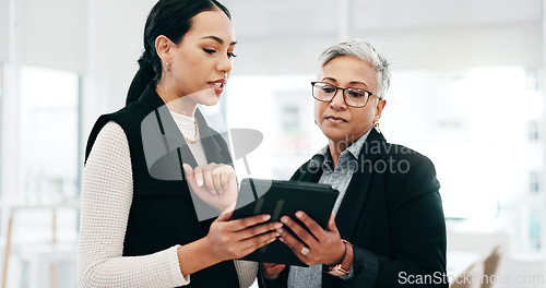 Image of Business people, talking or women with a tablet, teamwork or cooperation with collaboration, budget planning or stock market. Staff, manager or employee with tech, productivity, investment or trading