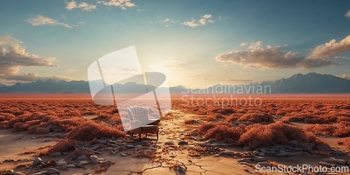 Image of Vintage Armchair in a Deserted Landscape at Sunset