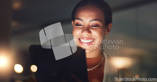 Image of Business woman, smile and tablet at night in office to search online report, scroll information and website planning. Happy corporate employee working late on digital data, tech or social network app