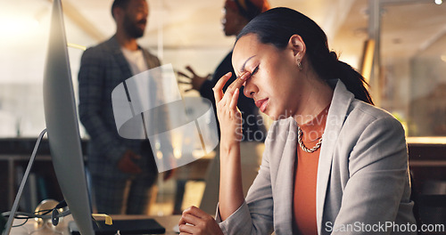 Image of Night, neck pain and business woman tired working on computer in a corporate company office with burnout. Overworked, frustrated and employee with stress for mistake, risk or fail on overtime project