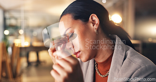 Image of Night, headache and business woman with stress working on computer in corporate company office with burnout. Overworked, frustrated and employee tired due to mistake, risk or fail on overtime project