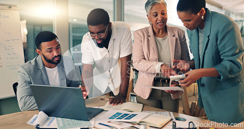 Image of Research, night and business people planning in the office for a creative project with color samples. Paperwork, discussion and team of designers working overtime in collaboration for deadline.