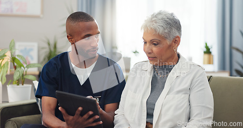 Image of Homecare, tablet or nurse with senior woman on sofa for internet, help or checking sign up service guide for home consultation request. Digital, app and man caregiver showing patient service options