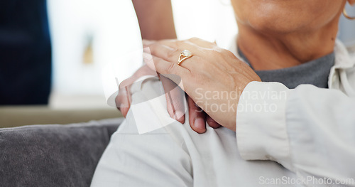 Image of Homecare, empathy or hands of caregiver with senior woman in house with kindness, comfort or support closeup. Shoulder, sorry and nurse with old person at home with understanding, trust or compassion