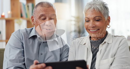 Image of Mature, couple and tablet on sofa for online streaming, reading ebook or happy with retirement plan at home. Senior people on digital technology for pension website, online choice or talking together