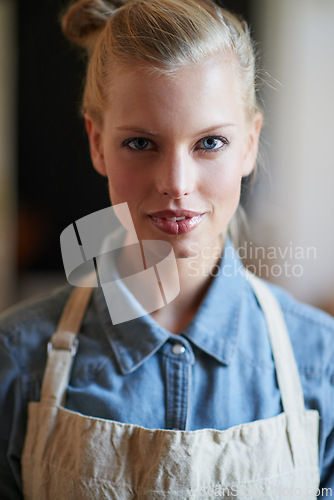 Image of Portrait, apron and a woman waitress standing waiting for customers and small business entrepreneur. Ready to serve, caffeine coffee and clients in store with a serious face and retail service