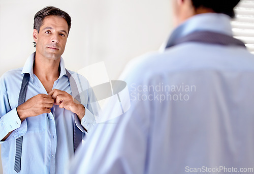 Image of Portrait, mature businessman mirror and getting ready for work or executive board. Shirt, fashion and corporate employee confident looking at his reflection whilst dressed in the morning in bedroom