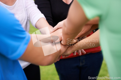 Image of Group, teamwork and hands together in unity for collaboration, support or trust in nature. Closeup of people or community piling for love, care or outdoor agreement in solidarity, mission or goals