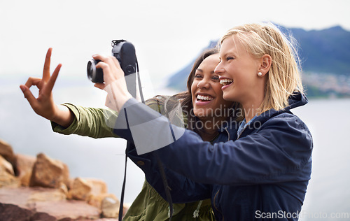 Image of Happy woman, friends and laughing with peace sign or camera for funny photography or moments together in nature. Female person with smile for photo, picture or memories of emoji on outdoor holiday