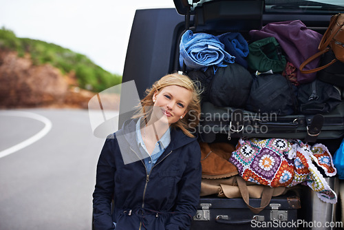 Image of Woman, portrait and car luggage on road trip on mountain or camp holiday, vacation or explore. Female person, smile and vehicle trunk or bags for European adventure or travel, transport or journey