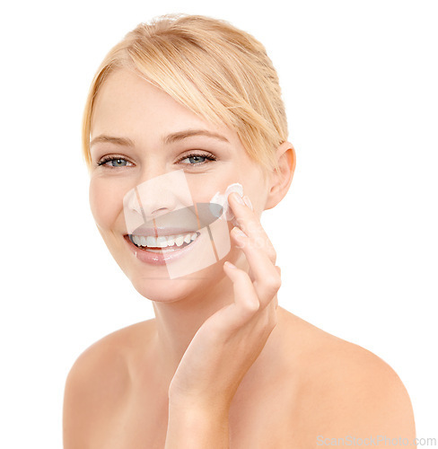 Image of Skincare, face cream and portrait of woman in studio with natural, health and beauty routine. Glow, smile and model with facial spf, sunscreen or lotion for dermatology treatment by white background.