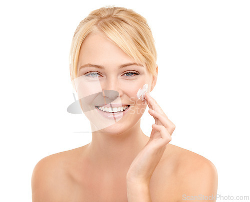 Image of Beauty, face cream and portrait of woman in studio with natural, health and skincare routine. Glow, smile and model with facial spf, sunscreen or lotion for dermatology treatment by white background.