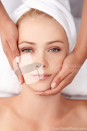 Image of Face massage, top view of woman and hands, beauty and wellness with spa treatment, facial and dermatology for glow. Skincare, benefits of pamper cosmetics and antiaging self care with masseuse