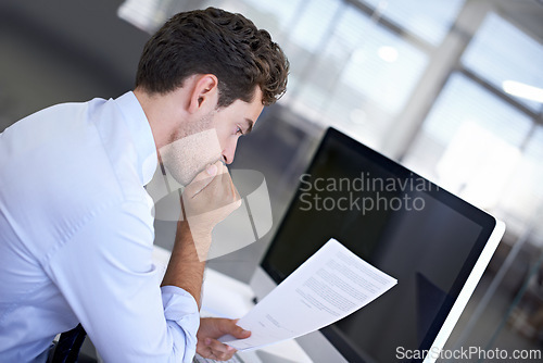 Image of Finance, business and man reading contract, feedback for compliance or legal document with company policy. Accountant, consultant or financial adviser with paperwork or review with a letter or report