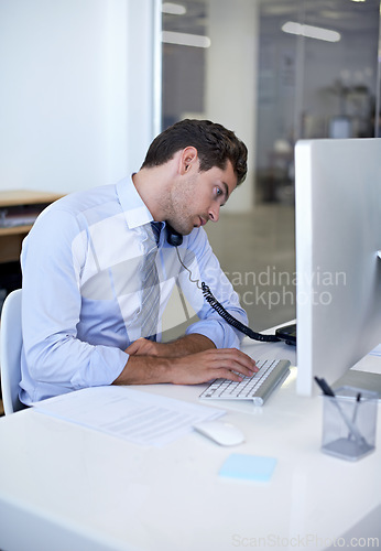Image of Businessman, phone call and computer in office or client communication or online sales, internet or networking. Male person, telephone and typing in New York company or job, discussion or connection