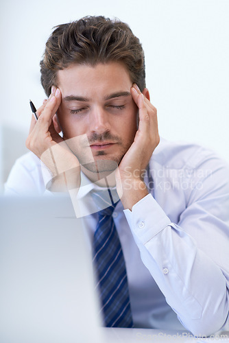 Image of Sick, headache and business man with pain, stress and anxiety for overwork in office. Migraine, depression and professional massage temples for burnout, fatigue and tired person frustrated by laptop