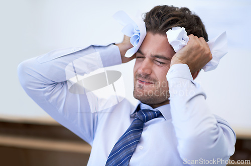 Image of Businessman, head and stressed with crumpled paper, burnout and mistake for frustration, debt and headache. Angry employee, worker and report for bills, worried and failure with audit or deadline