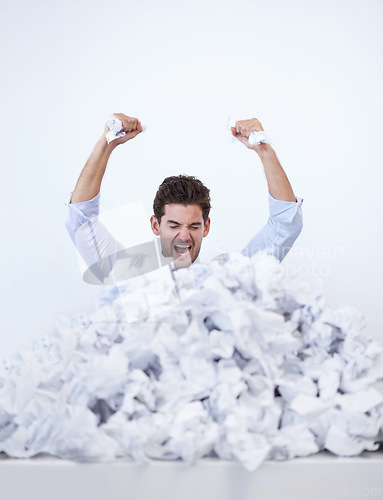 Image of Businessman, paperwork and pile or frustrated hands in work load as accountant or deadline, document or stress. Male person, corporate and trapped in responsibilities or career, overworked or problem