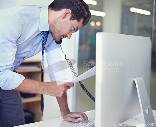 Image of Businessman, phone call and computer for discussion as with paperwork for client loan, investment or accounting. Male person, telephone and financial consultant in New York, planning or networking