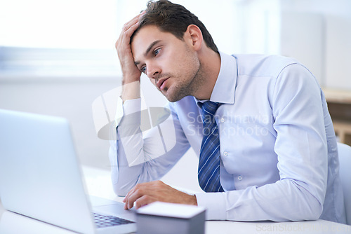 Image of Laptop, frustrated or business man with depression, fail or overwork in office for mistake. Computer, stress or serious professional with bankruptcy, taxes or challenge of financial crisis with email