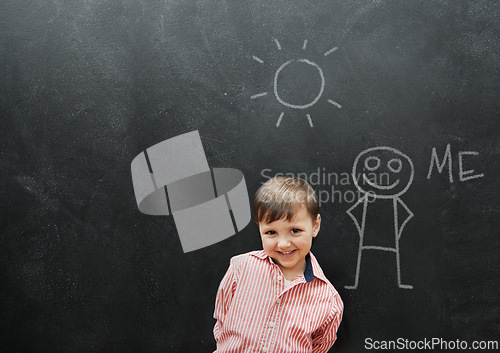 Image of Child, boy and portrait or smile by blackboard with drawing, character or creative fun in classroom at school. Kid, student or happy for illustration, education or chalkboard with mockup at preschool