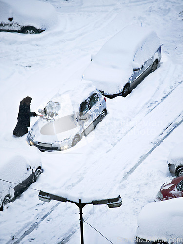 Image of Person, cars and road with winter snowstorm or nature environment in Vancouver, cold weather or transportation. Travel, vehicle and frozen or ice on town street for climate season, outdoor or frost
