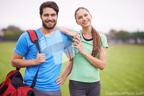 Image of Fitness, couple in portrait outdoor and workout on field, happy and healthy with partner, physical activity and support. People smile for wellness, exercise together in park and training for bonding