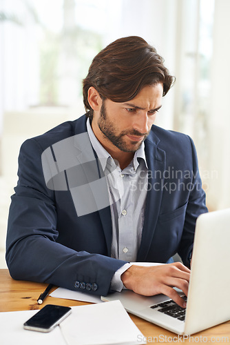 Image of Desk, laptop and businessman typing, thinking and research notes for financial analyst in office. Consultant, business advisor or professional man writing report, email and planning ideas for startup